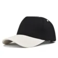 Vista detallada de gorra de béisbol en blanco y negro con visera curva y ojales. - Ajustable / Caqui Mezclado Negro