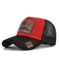 Detail of the hunting mesh baseball cap showcasing the deer leather patch and contrast stitching. - Adjustable / Black Red Red Thread (CM802-10)