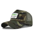 Detailed view of the camouflage trucker hat featuring embroidered fish patch and mesh back. - Adjustable / Khaki Camouflage