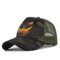 Halloween camo mesh baseball cap detail view, breathable trucker hat with spooky pumpkin print. - Grey Camouflage