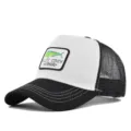 Detailed close-up view of the black and white trucker hat featuring a fishing logo patch. - Adjustable / Black And White