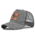 Gorra trucker gris clásica con parte trasera de malla y parche de tiburón de cuero. - Ajustable / Gris Jaspeado Malla Gris