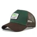 Detailed view of the mesh baseball cap with embroidered fish patch and curved brown brim. - Adjustable / CM714-27 Coffee & Green Spliced with Coffee Mesh
