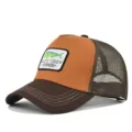 Men's mesh trucker hat featuring a embroidered fish patch and curved brim for summer outdoor sports. - Adjustable / CM714-28 Coffee & Caramel Spliced with Coffee Mesh