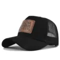 Schwarze Trucker Cap mit braunem Leder-Patch, atmungsaktive Mesh-Baseballkappe für den Sommer. - Verstellbar / Schwarz