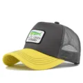 Classic trucker baseball cap with mesh back, yellow curved brim and embroidered fish patch. - Adjustable / Yellow/Gray