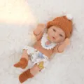11 Inch Reborn Baby Doll Cute Vinyl Infant Toy with Knitted Sweater Outfit and Matching Hat - Brown Sweater Shorts Style (Q11-048-054)