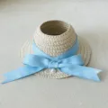 Detail view of the woven doll straw hat featuring a delicate light blue bow and pearl accent. - For 17CM Doll / Light Blue Bowknot (CM-012-04)
