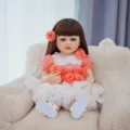 Reborn baby doll, 22 inch silicone vinyl simulation infant doll with pink rose dress and brown hair. - Pink White Lace Rose Dress Style (Q22-005-047) / 55cm