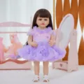 22 inch reborn baby doll full vinyl simulation infant doll with purple dress and sandals. - Purple Bow Puffy Dress Style (Q22-005-049) / 55cm