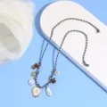 Bohemian braided letter anklet with pearls and shells, perfect for summer beach vacation. - Letter R