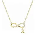Dettaglio della collana con infinito dorato, cristalli luminosi e ciondolo con lettera X. - Oro X