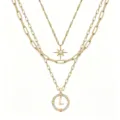Set di collane d'oro multistrato con ciondolo a lettera bussola e stella a sei punte. - Stile L
