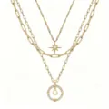 Elegante collana multistrato dorata con ciondolo bussola lettera e stella per donne. - Modello O