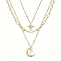Multi-layer gold tone chain necklace featuring star and moon diamond pendants with letter P. - Pattern P