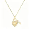 Close-up detail of gold heart padlock necklace with crystal pave and letter U pendant. - Letter U