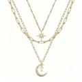 Multi-layer gold necklace featuring a star pendant and crescent moon with letter T detail. - Pattern T