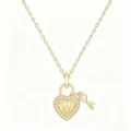 Detailed view of gold crystal heart lock necklace with letter W and small key pendant detail. - Letter W