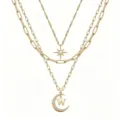 Close-up detail of the multi-layer gold necklace featuring star and letter W pendant. - Pattern W