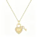 Close-up detail of the gold heart padlock pendant necklace with sparkling crystals and letter Y. - Letter Y