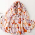 Detail shot of the French style pebble printed scarf, soft linen-cotton touch, elegant drape. - Red Pebble Print / 180x88cm