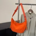 Bolso cruzado dumpling de nylon naranja, bolso informal versátil de gran capacidad para mujer. - Naranja Neón