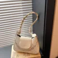 Chic minimalist shoulder bag for women, stylish star pattern PU leather handbag with chain. - White