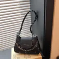 Trendy black underarm shoulder bag for women, stylish star print design with chic braided handle. - Black