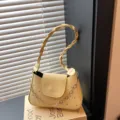 Trendy light yellow shoulder bag for women, chic star print with twisted handle design. - Yellow
