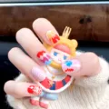 Uñas postizas para niños estilo dopamina lindo 12pzas pegatinas de uñas coloridas diseño dibujos - ET034-B3 Kit en caja para niños mayores con pegamento