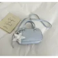 Light blue Boston handbag, stylish casual crossbody purse with silver star charm and handles. - Blue with Charm