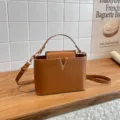 Sac seau en cuir marron avec décor V en métal, élégant sac à épaule pour femme chic. - Marron