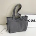 Stylish dark grey corduroy tote bag with multiple pockets, perfect for daily commute and school use. - Dark Gray