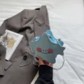 Borsa a tracolla a stella blu, borsa a spalla in pelle PU carina con catena e design del viso. - Blu