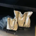 Beige suede chain tote bag, stylish slouchy shoulder bag with drawstring for women. - Beige