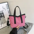 Stylish pink canvas tote bag with black handles, casual shoulder crossbody bag for women. - Rose Red