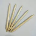 Detailed view of natural wooden cuticle sticks, double-ended nail art tools for cleaning and dotting. - 7.5cm Long * 3.8mm