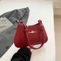 Bolso de hombro rojo de cuero PU para mujer, bolso elegante con decoracion de estrella. - Rojo