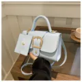 Bolso bandolera retro azul claro con hebilla de metal y mini bolsita para mujer. - Azul