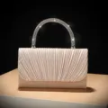 Elegante champagne geplooide avondtas met sprankelende strass handgreep voor feestjes. - Broken Wit
