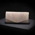 Gedetailleerd overzicht van elegante gouden glitter geplooide avondtas, perfect voor feestjes. - 20*5*10CM / Goud
