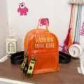 Mochila mini transparente de PVC jelly para mujer, bolso casual de verano con estilo. - Naranja