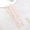 Set de uñas postizas con estampado floral y degradado nude en soporte de plástico. - Estrella Adornada Rosa Suave