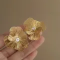 Gold metallic flower stud earrings with clear crystal center for women fashion jewelry. - Gold-Hollow Flower (2#)