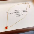 Gold-tone chain necklace featuring a charming red heart pendant for women jewelry gift accessory. - Gold Heart Necklace Type 2