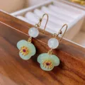 Retro green resin flower hook earrings with white beads and gold-plated finish for women. - Vintage Flower (196#)