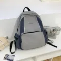 Graublaues, farbblockiertes Freizeitschul-Rucksack für Studenten, stilvolle leichte Schultasche. - Grau