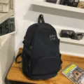 Schwarzer Nylon-Rucksack mit vielen Taschen, vielseitige Freizeittasche für Outdoor. - Schwarz