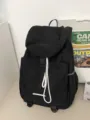 Schwarzer Freizeitreise Rucksack mit Kordelzug und grossem Stauraum für Studenten. - Schwarz