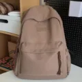 Lockerer Canvas-Rucksack für Studenten, stilvoller minimalistischer Schulranzen für den Alltag. - Ohne Anhänger / Braun